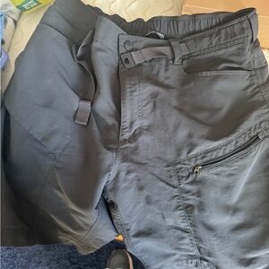 The North Face Black Performance Shorts. Please note melted logo on short